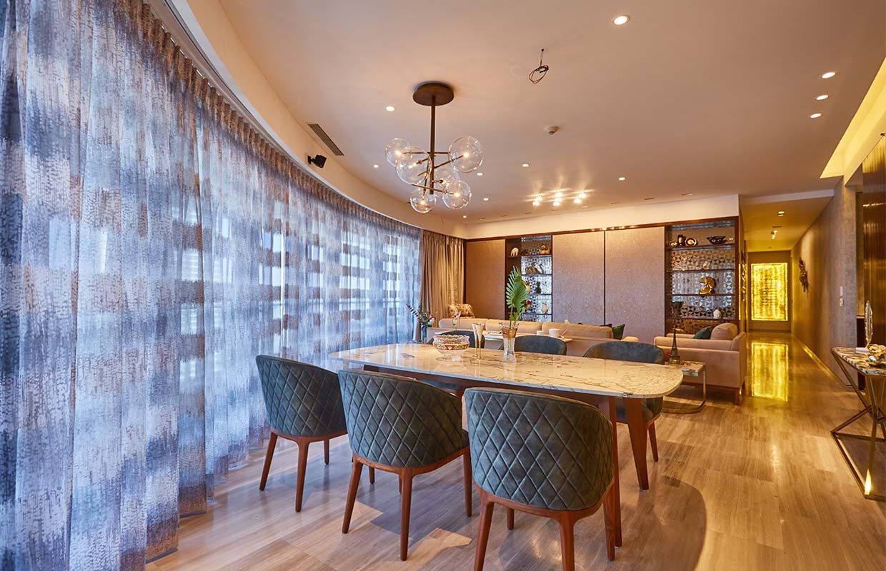 Warm timber and stone residence, living and dining